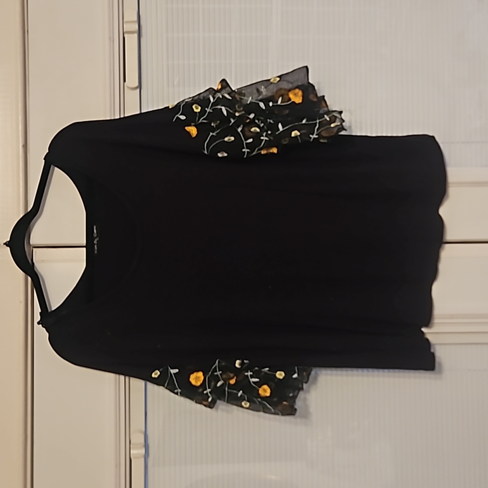 Black shirt with embroidered floral on tiered sleeves